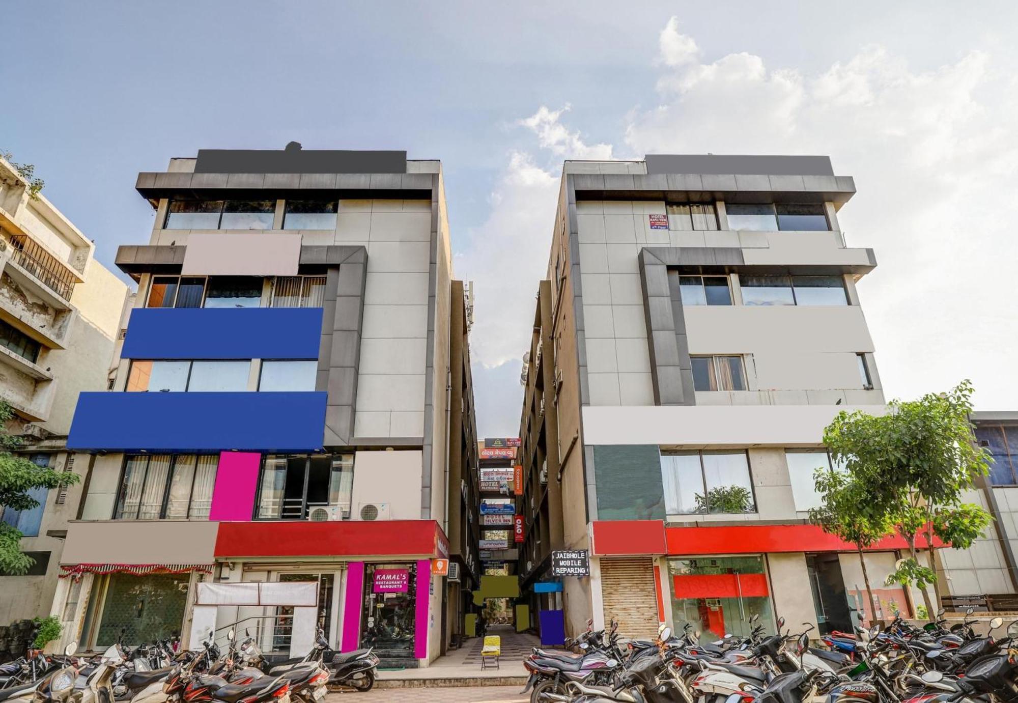 Capital O Maple View Hotel Naroda Bagian luar foto